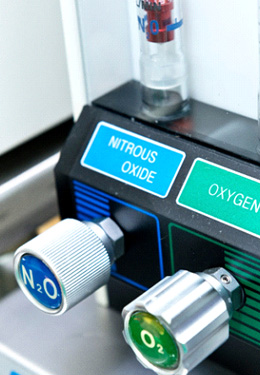 Nitrous oxide and oxygen knobs on sedation machine