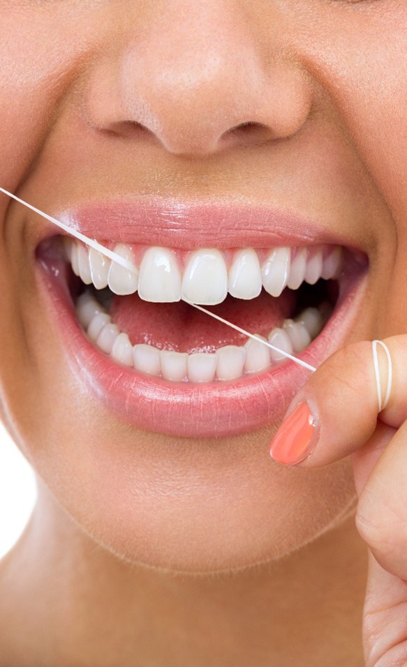 A woman before and after gum recontouring