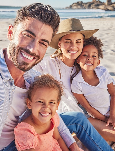 Person smiling with their family