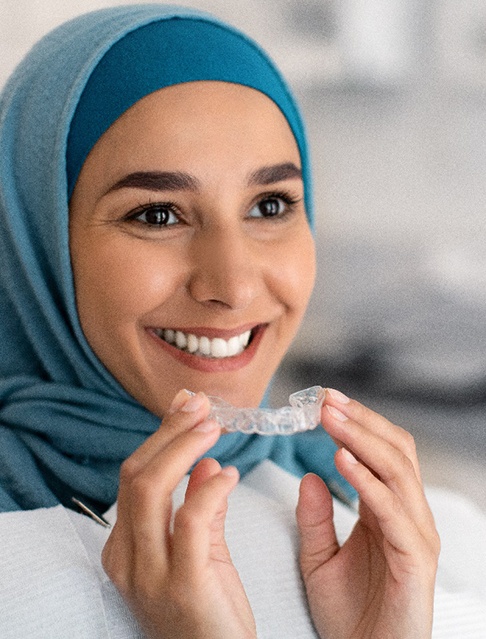 Closeup of a dental patient wearing a clear aligner