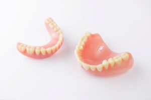 Upper and lower dentures side by side.